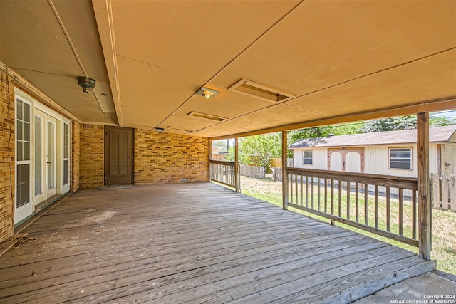 deck with an outbuilding