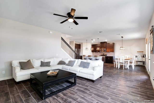 living room featuring ceiling fan