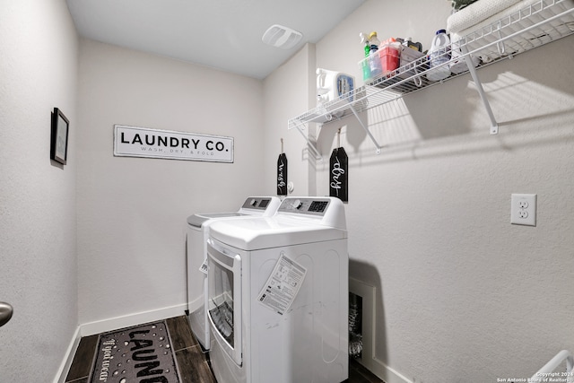 laundry room featuring separate washer and dryer