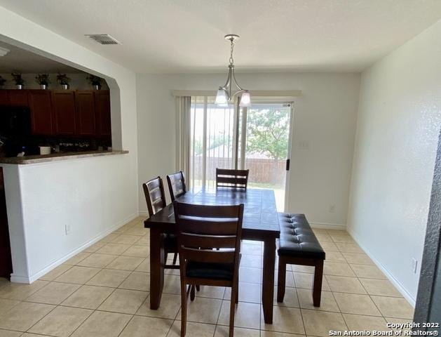 25231 Cambridge Wl, San Antonio, TX 78261 - dining room with light tile patterned floors and baseboards