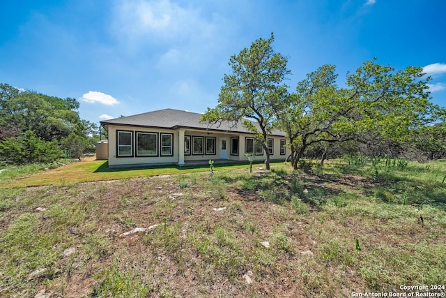 view of front of home with a front yard