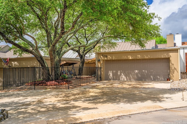 view of front of home with a garage