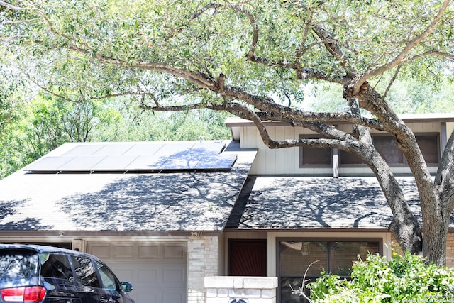 exterior space featuring solar panels