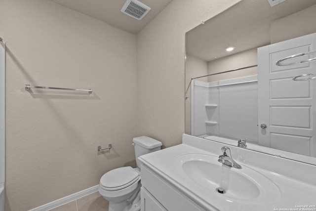 bathroom featuring walk in shower, toilet, tile patterned floors, and vanity