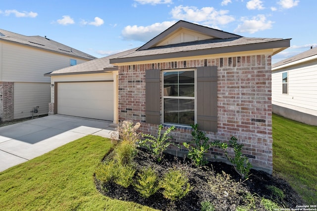 ranch-style house with a garage and a front yard