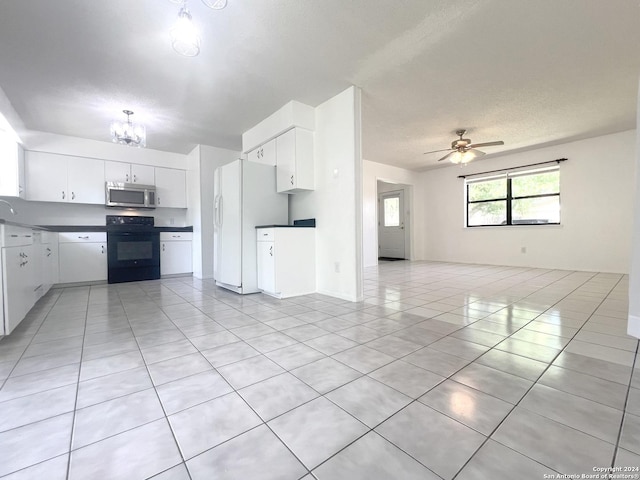 kitchen with white fridge with ice dispenser, range, white cabinets, and light tile patterned floors