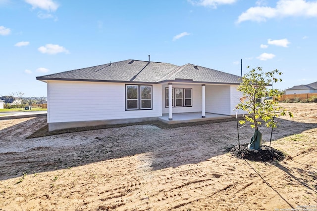 back of house with a patio area