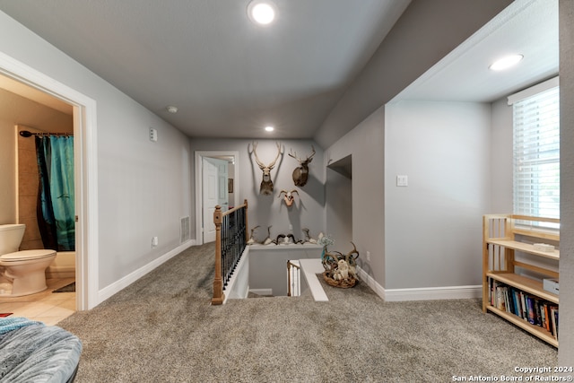 recreation room featuring carpet flooring