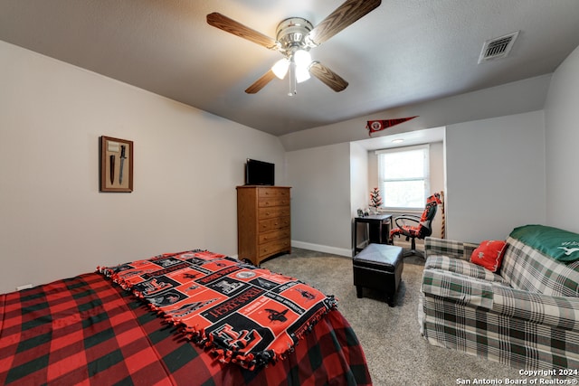 carpeted bedroom with ceiling fan