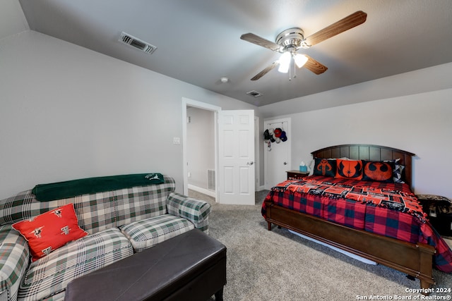 bedroom with carpet flooring, ceiling fan, and vaulted ceiling