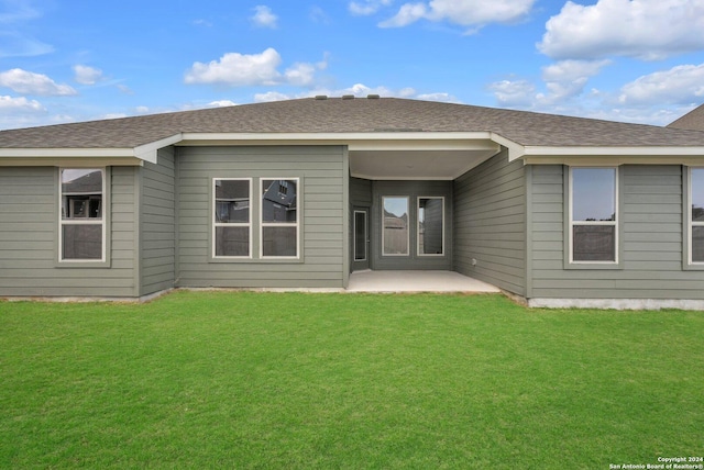 213 Fillmore Fls, Cibolo, TX 78108 - back of house with a patio area, a lawn, and roof with shingles