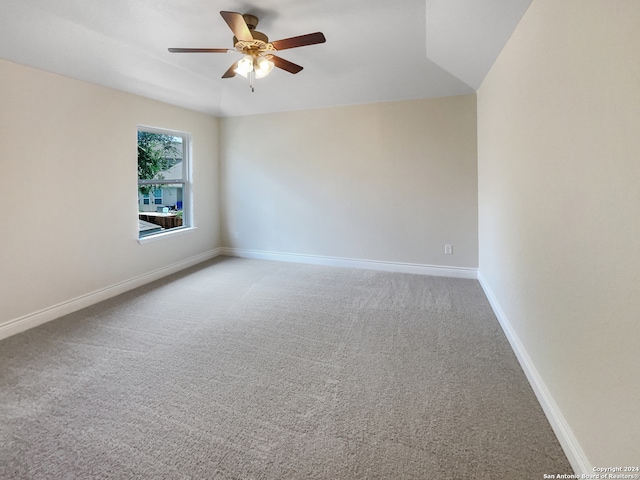 carpeted empty room with ceiling fan