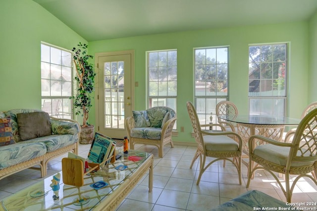 sunroom / solarium with vaulted ceiling