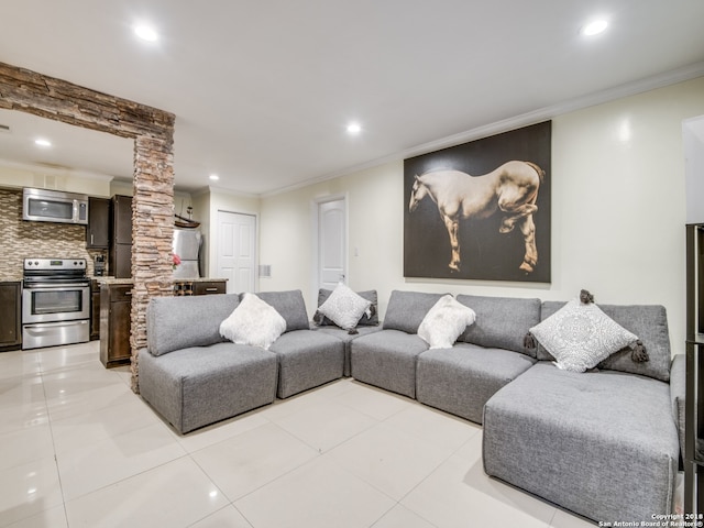 tiled living room featuring crown molding