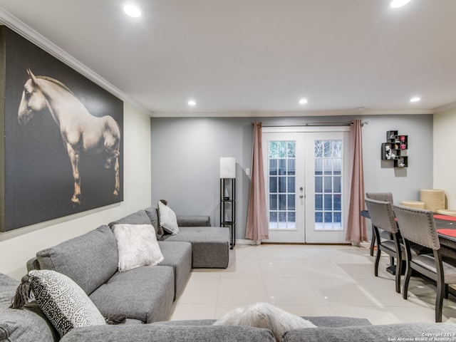 tiled living room with crown molding and french doors