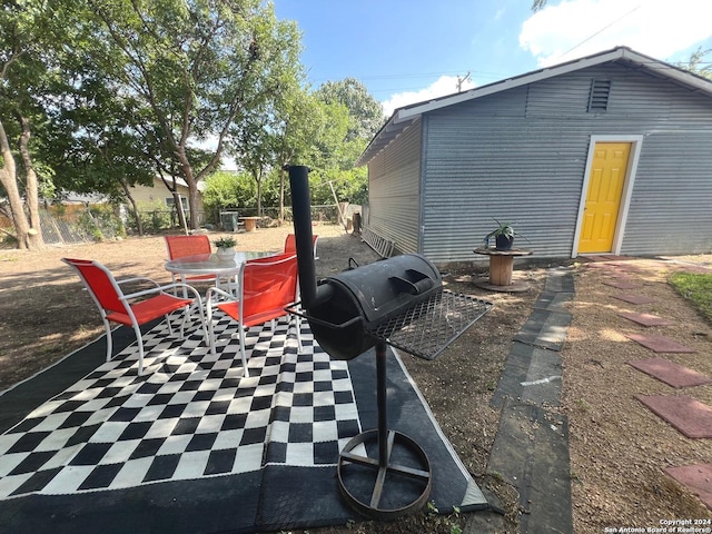 view of patio / terrace with fence and outdoor dining space