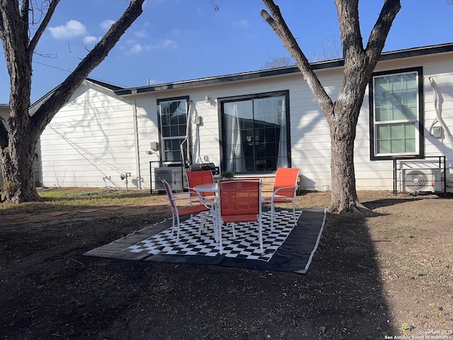 back of house with a patio area