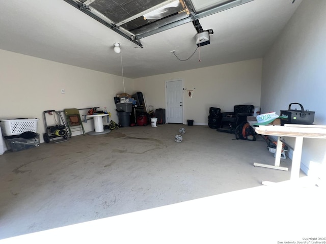 garage featuring a garage door opener