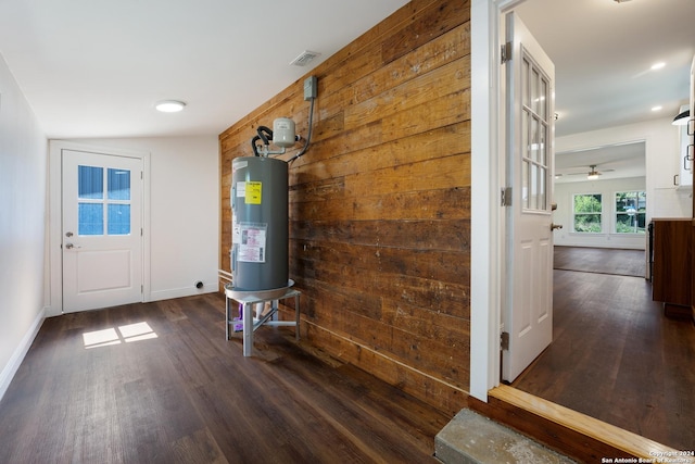 utility room featuring water heater