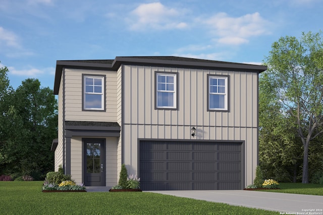 view of front of home with a garage and a front yard