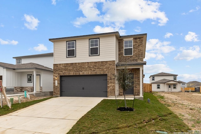 front of property with a garage and a front yard