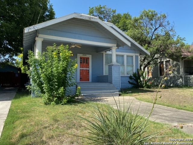 bungalow with a front yard