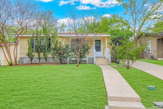 view of front of home with a front yard