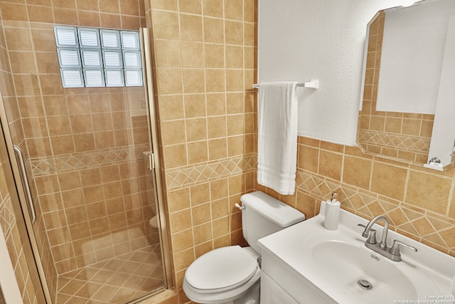 bathroom with walk in shower, tile walls, toilet, and vanity