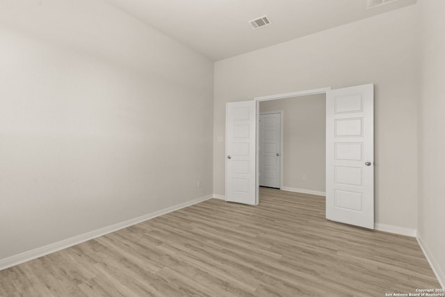 unfurnished bedroom featuring light hardwood / wood-style floors