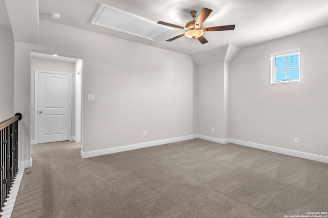 spare room with light carpet and ceiling fan