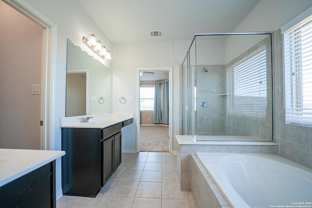 bathroom featuring separate shower and tub, tile patterned floors, and vanity