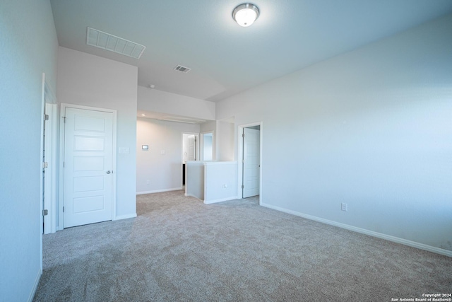 unfurnished bedroom with a closet and carpet flooring