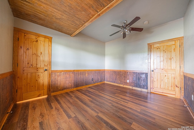 unfurnished room featuring wood ceiling, hardwood / wood-style floors, and ceiling fan