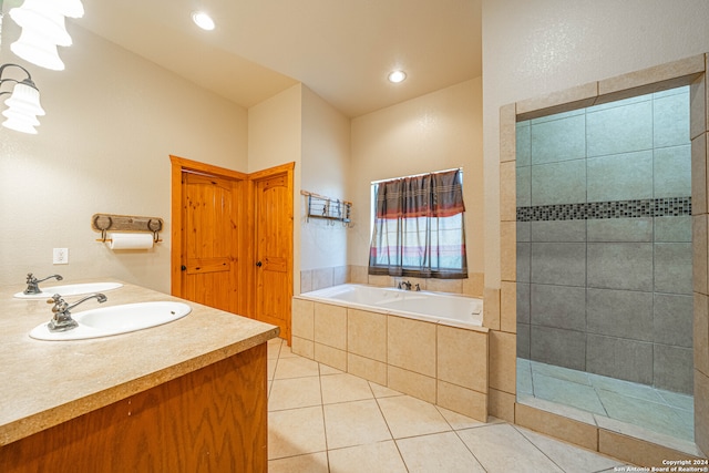 bathroom featuring vanity, plus walk in shower, and tile patterned floors