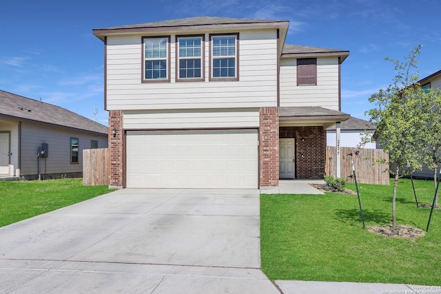 front of property featuring a garage and a front lawn