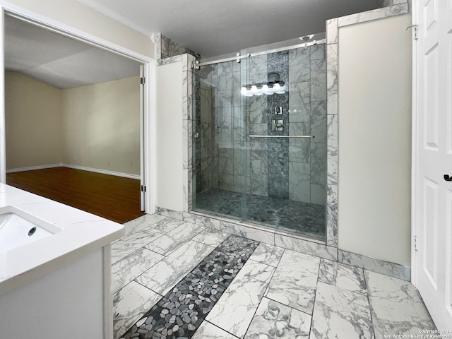 bathroom with vanity, tile patterned floors, and a shower with door