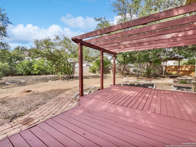 deck featuring a pergola