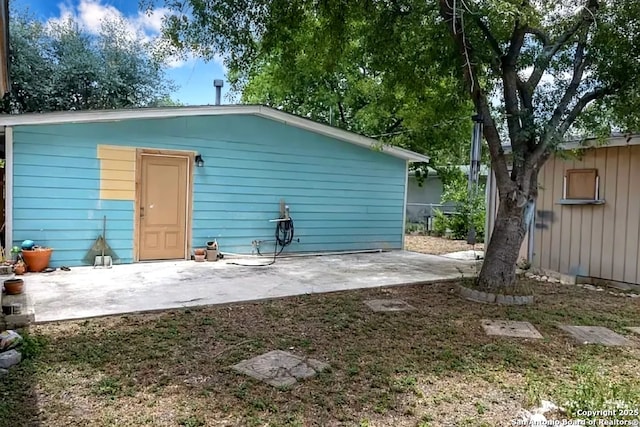 back of house featuring a patio area