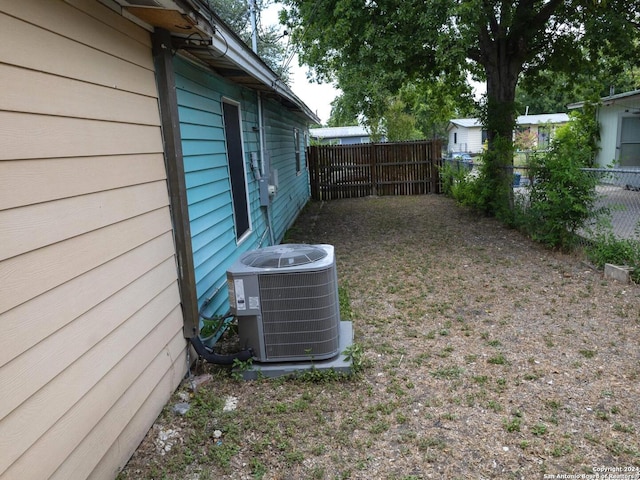 view of yard featuring central AC unit