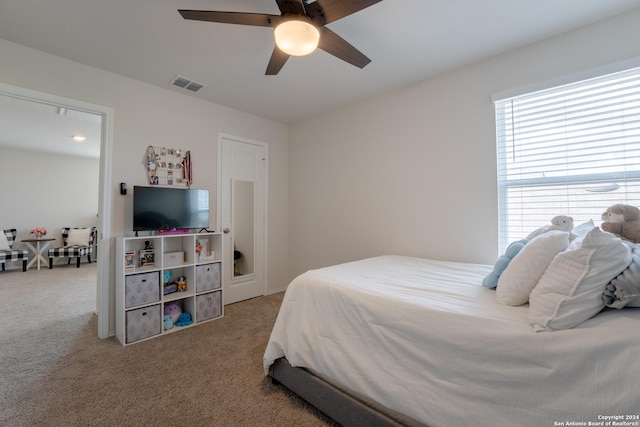 bedroom featuring carpet flooring and ceiling fan