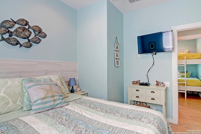 bedroom featuring hardwood / wood-style floors