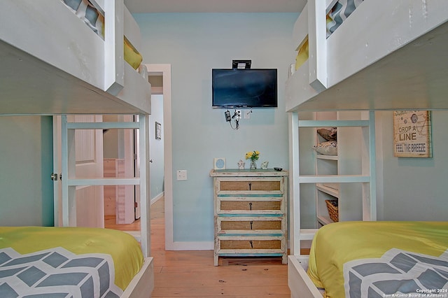 bedroom featuring wood-type flooring