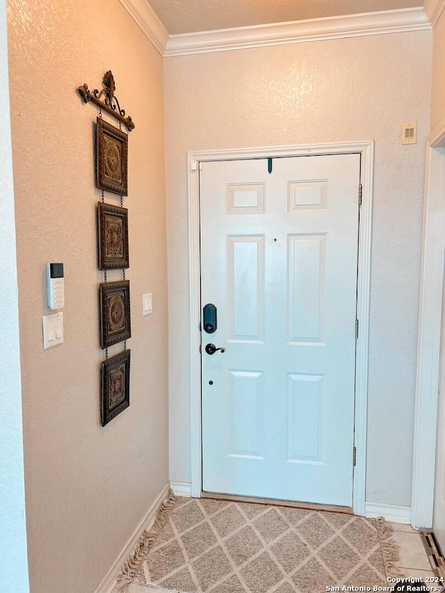 doorway to outside featuring ornamental molding