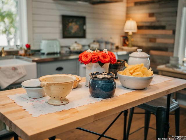 dining area with wooden walls