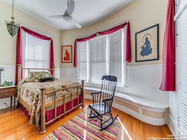 bedroom featuring ceiling fan and wood-type flooring