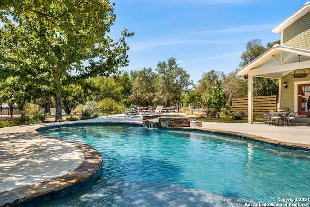 view of swimming pool featuring a patio