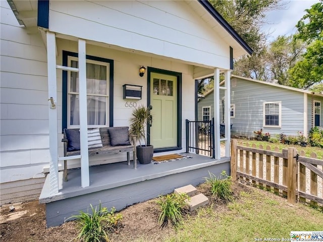 doorway to property with covered porch