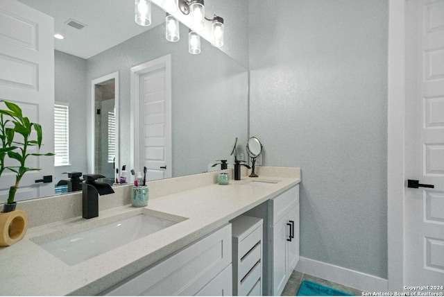 bathroom featuring vanity and tile patterned floors