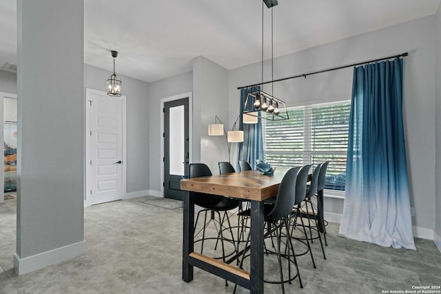 dining room featuring an inviting chandelier