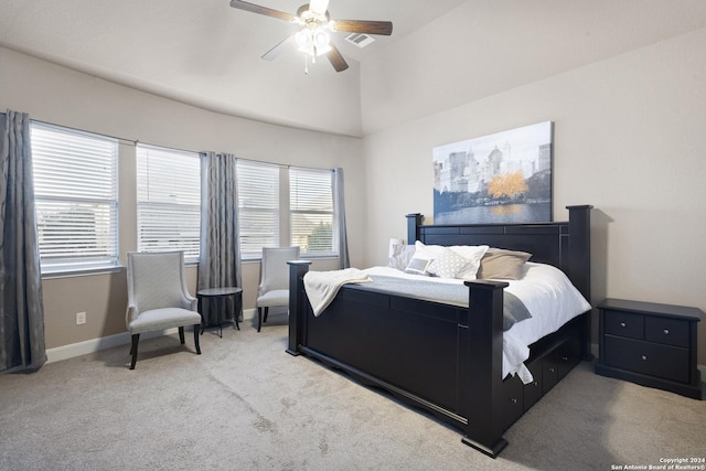 carpeted bedroom featuring ceiling fan and lofted ceiling